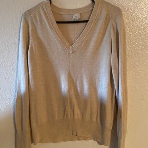 A New Day brand size L, v-neck, light weight, cream/tan color sweater.